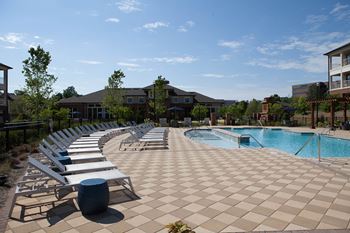 Resort-style swimming pool w/ sundeck